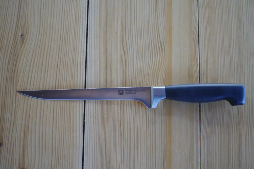 Zwiling 7" Pro Fillet Knife on a table