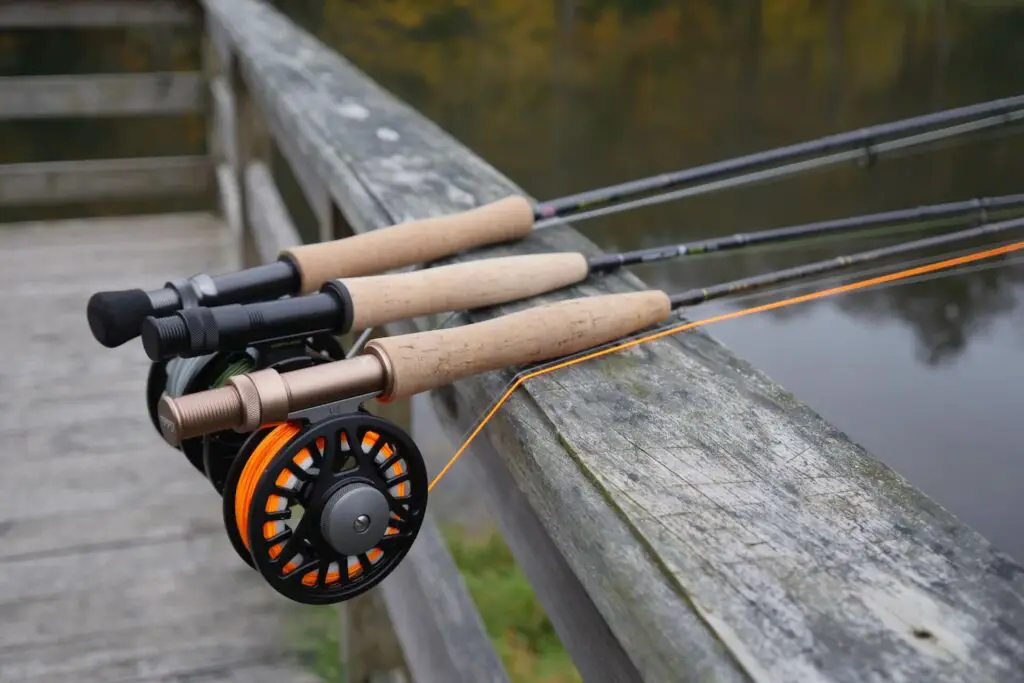 Fly Fishing Rod Combos on Wooden Dock