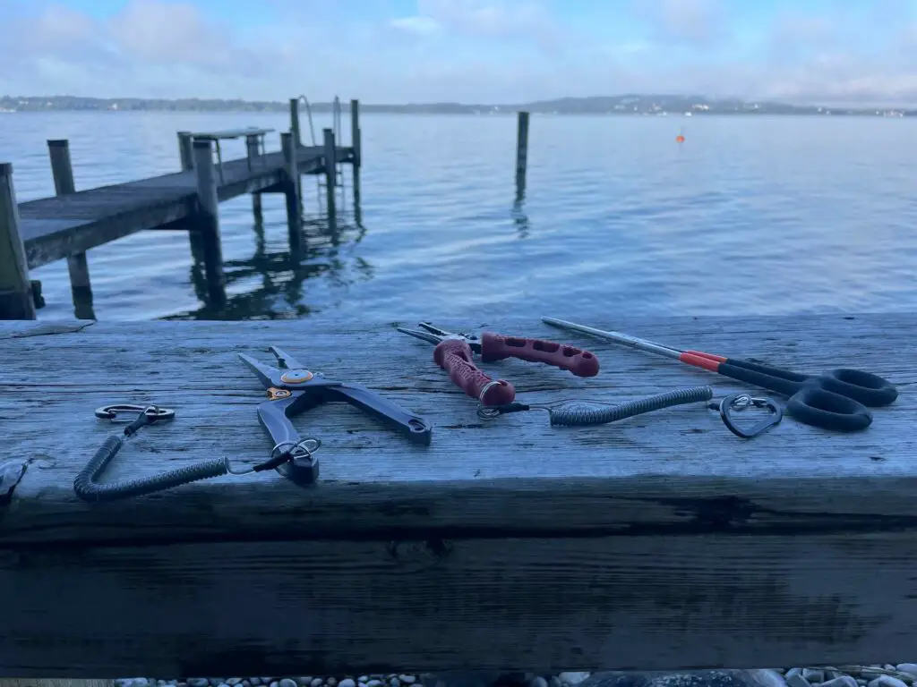 Fishing Pliers on wooden dock